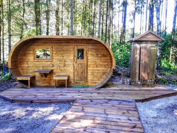 Wooden sauna and an outdoor shower