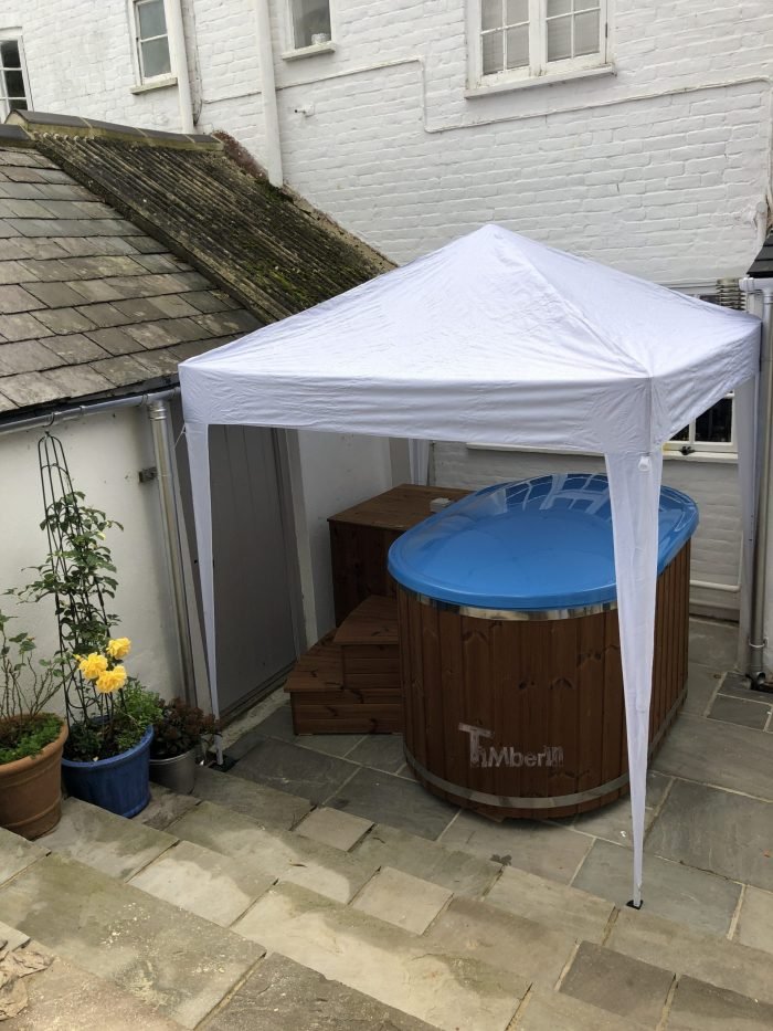 Oval hot tub for 2 persons with fiberglass liner, stephen, bridport, united kingdom (1)