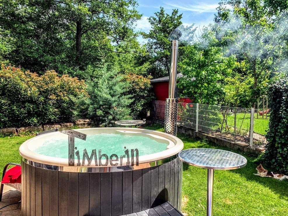 TimberIN Wellness hot tub finished with dark Neular composite exterior panels