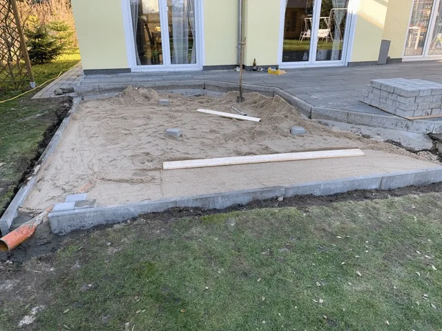 Preparing the Base for a Hot Tub or Outdoor Sauna 7 Edge restraints and compacted mineral sub-base prepared for a paved hot-tub foundation