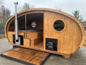 Outdoor oval sauna with an integrated hot tub (14)