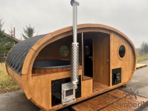 Outdoor oval sauna with an integrated hot tub (15)