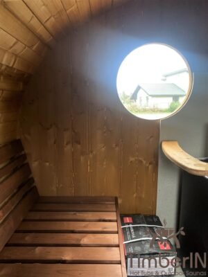 Outdoor oval sauna with an integrated hot tub (24)