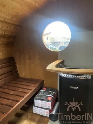 Outdoor oval sauna with an integrated hot tub (25)