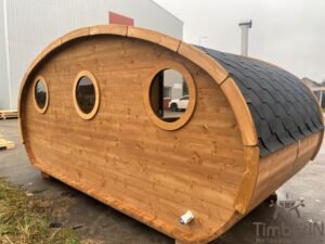 Outdoor oval sauna with an integrated hot tub (30)