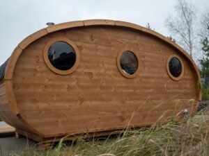 Outdoor oval sauna with an integrated hot tub (81)