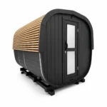 TimberIN Nordic Electric Barrel Panorama™ – compact electric barrel panorama sauna with dark rounded shell, slatted timber side wall, full-height glazed door and support base on a white background.