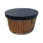 Insulated cover for hot tub – round timber hot tub fitted with a closed black insulated leather-effect cover on a white background.
