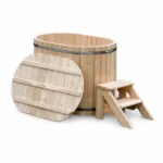 TimberIN Nordic Duo™ Wood – oval two-person solid-timber soaking tub with curved wooden benches, timber steps and round wooden lid on a white background.