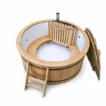 4 Person Hot Tubs 8 TimberIN Nordic Flex round hot tub with polypropylene liner, timber benches, integrated internal stove, wooden ladder and upright wooden cover on a white background.
