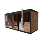 TimberIN Nordic Modular Spa™ – modern modular outdoor spa building with dark frame, timber façade, glazed sauna section, wood-fired heater and enclosed changing area on a white background.