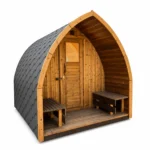 TimberIN Nordic Pod™ Porch – arched outdoor sauna pod with warm timber interior, covered front porch, side benches and dark shingle roof on a white background.