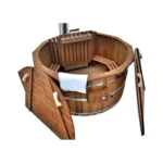 4 Person Hot Tubs 3 Thermowood Hot Tub – TimberIN Nordic™ Deluxe (Wood-Fired, 4–8 Person) – round thermowood hot tub with timber interior, raised backrest, integrated wood stove and chimney, wooden steps and paddle on a white background.