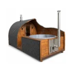 TimberIN Nordic Pod Duo™ – arched sauna pod joined to a square hot-tub module with grey liner, integrated stainless-steel wood stove and chimney on a white background.