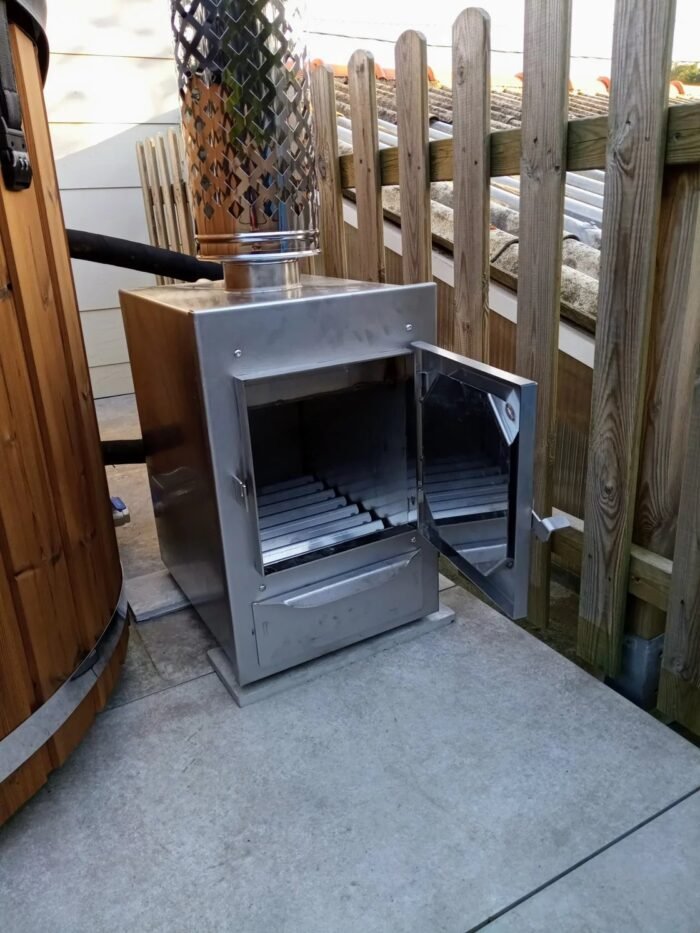 Open firebox and guarded flue on an external hot tub stove