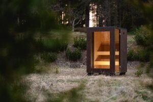 TimberIN Nordic Cube S sauna in the evening